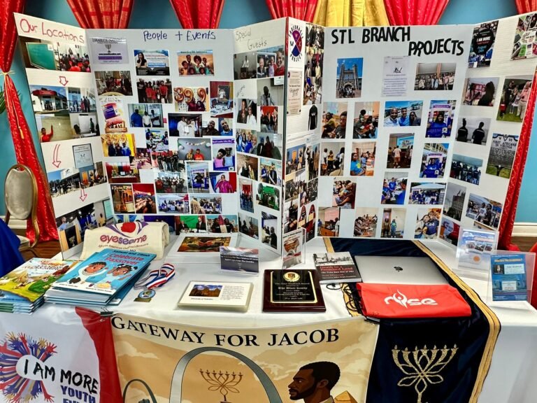 Community history display featuring St. Louis branch projects and photographs